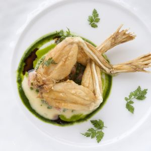 Ready-to-eat delicious cooked frog legs with parsley and butter - 350g (frozen)